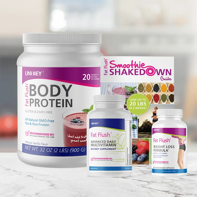 Fat Flush Smoothie Shakedown bundle sitting on a white kitchen countertop.  Products include: Fat Flush Body Protein, Advanced Daily Multivitamin, and Weight Loss Formula