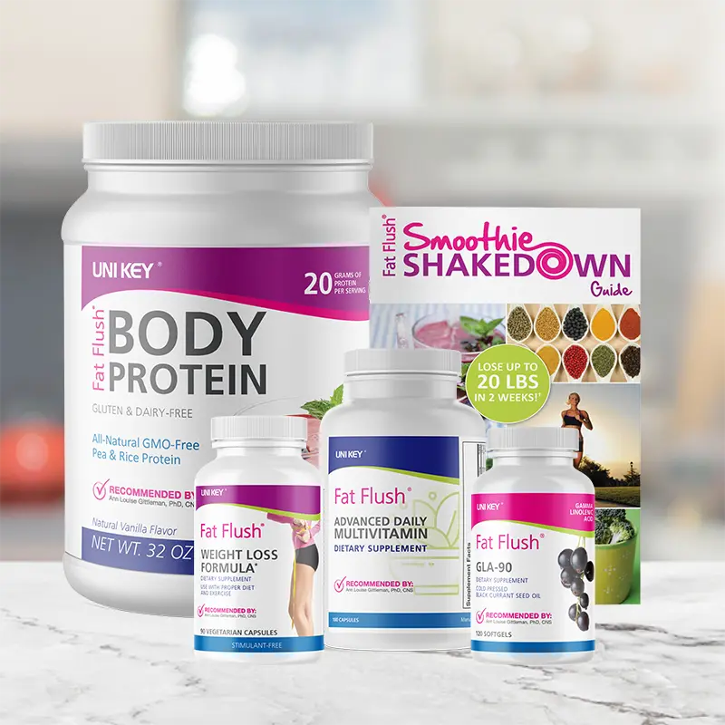 Fat Flush Smoothie Shakedown bundle sitting on a white kitchen countertop.  Products include: Fat Flush Body Protein, Advanced Daily Multivitamin, and Weight Loss Formula